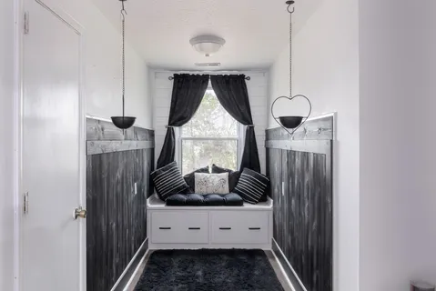 a picture of a room with a table and chairs