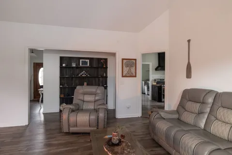 a view of room with wooden floor