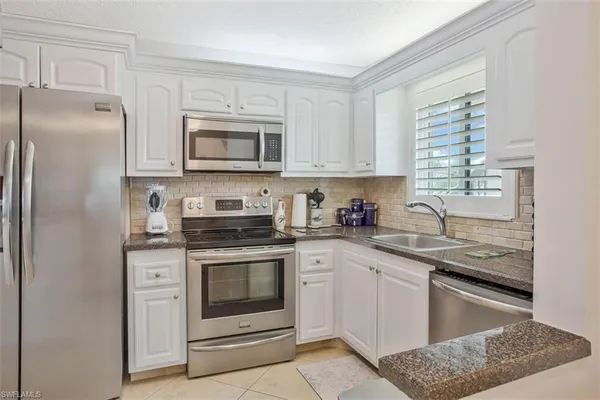 $1,700 | 4318 27th Court Southwest, Unit 101, Naples, FL 34116