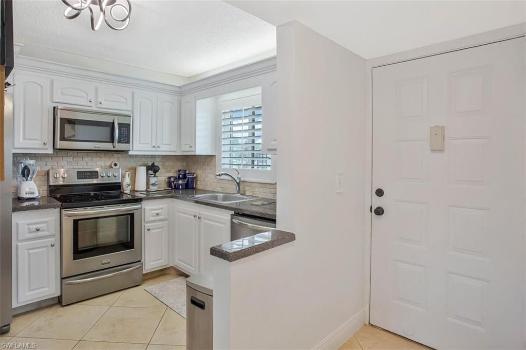 4318 27th Court Southwest, Unit 101 Naples, FL 34116 - Photo 15 of 32 upgraded and updated