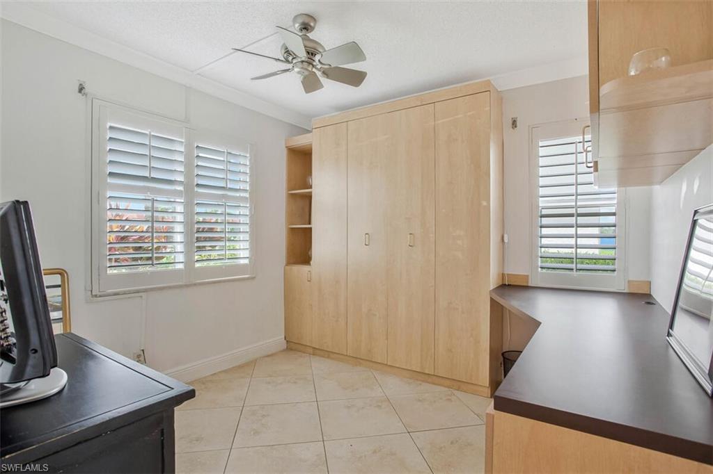 4318 27th Court Southwest, Unit 101 Naples, FL 34116 - Photo 3 of 32 Murphy bed and office