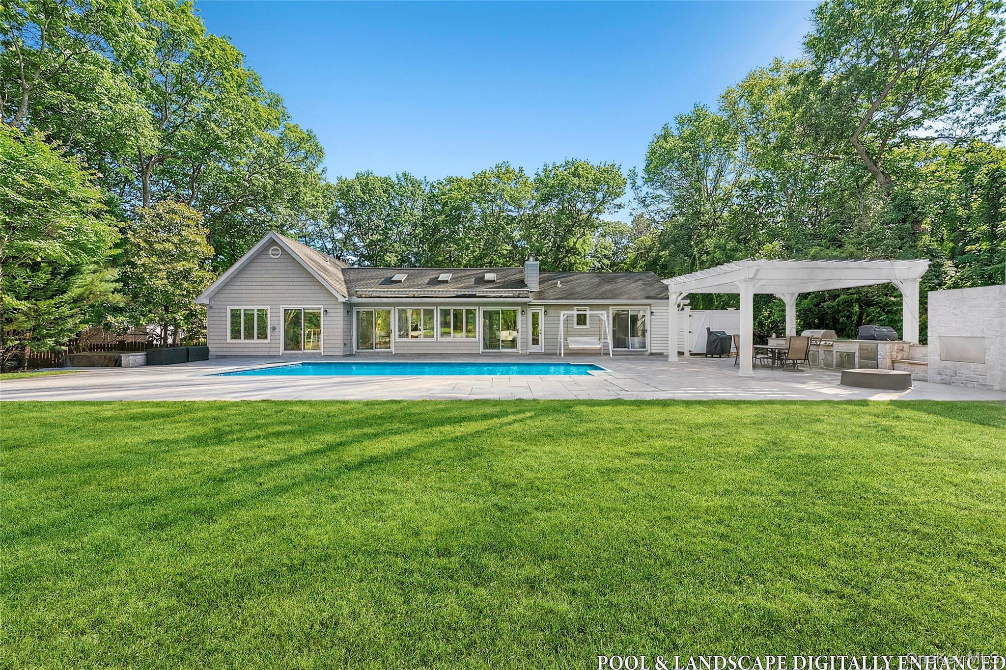 a front view of house with yard and seating area