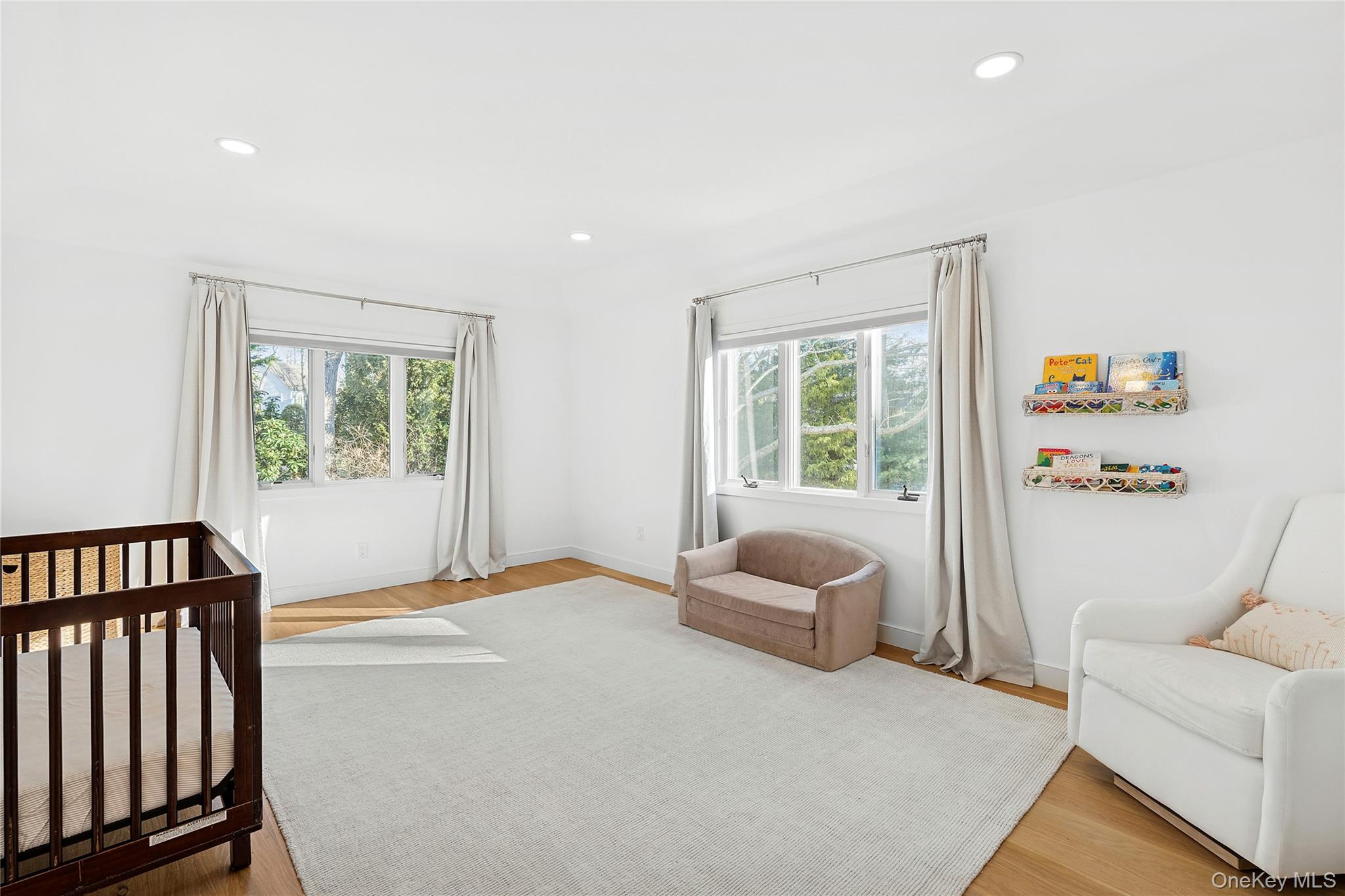 47 Bridle Path Remsenburg, NY 11960 - Photo 16 of 20 a bedroom with furniture and a window