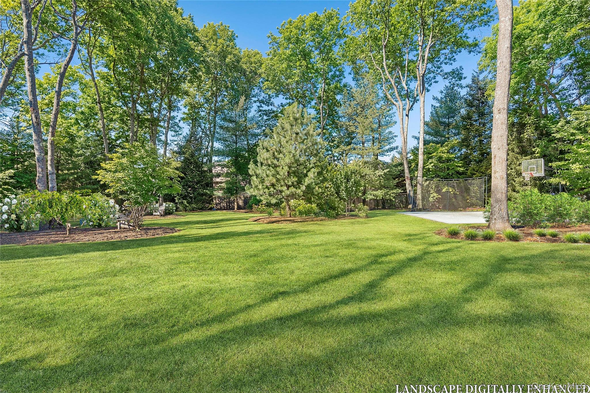 47 Bridle Path Remsenburg, NY 11960 - Photo 3 of 18 a view of outdoor space with deck and trees