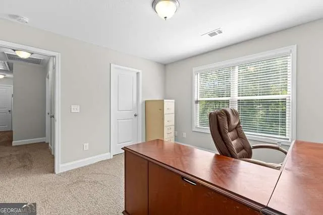 an empty room with windows