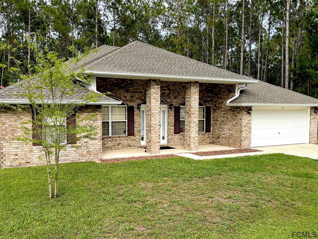56 Karat Path Palm Coast, FL 32164 - Photo 2 of 44 STUNNING BRICK HOME!