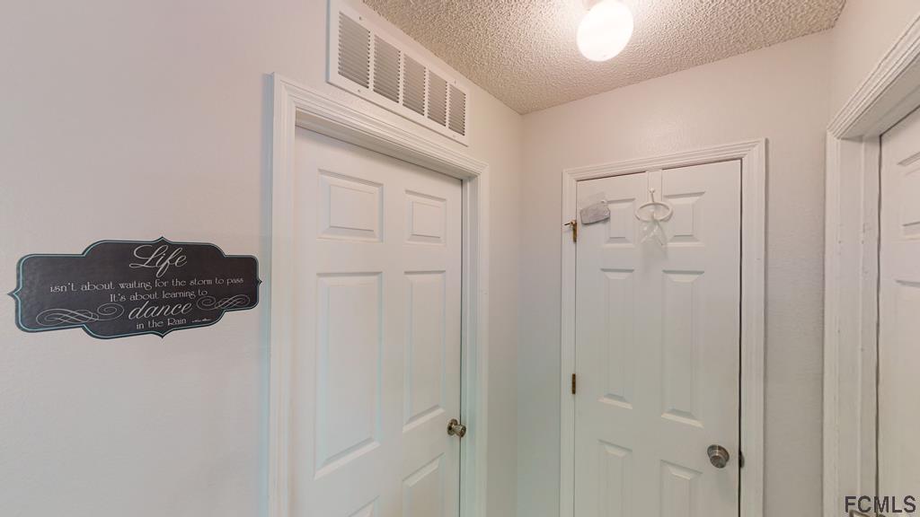 56 Karat Path Palm Coast, FL 32164 - Photo 15 of 44 TRANSITIONAL HALLWAY!