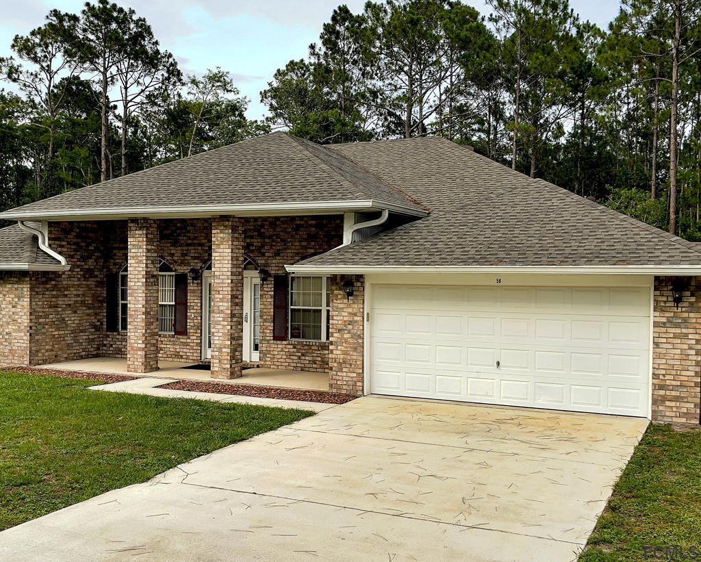 56 Karat Path Palm Coast, FL 32164 - Photo 3 of 44 NEW ROOF INSTALLED IN 2018!