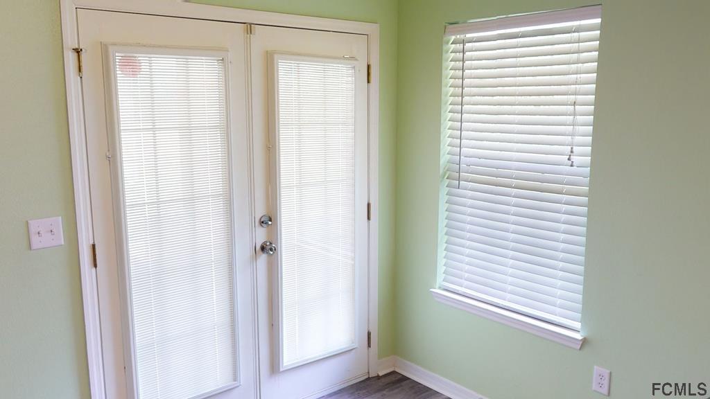 56 Karat Path Palm Coast, FL 32164 - Photo 23 of 44 PRIVATE ACCESS TO LANAI THROUGH THESE FRENCH DOORS