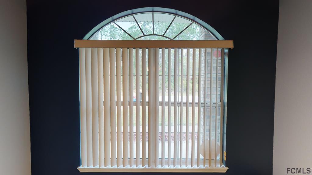 56 Karat Path Palm Coast, FL 32164 - Photo 29 of 44 ALL FRONT ROOMS HAVE ARCHED WINDOWS!