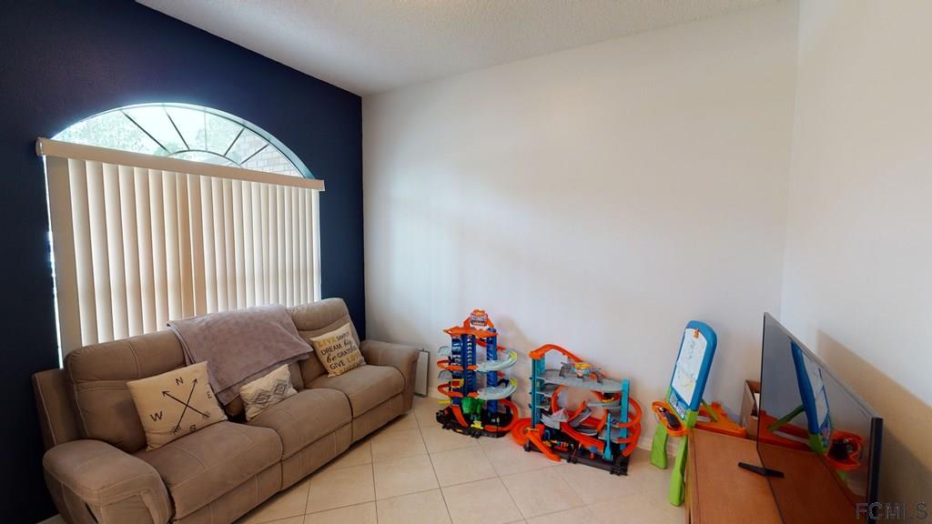 56 Karat Path Palm Coast, FL 32164 - Photo 31 of 44 SEPARATE FRONT ROOM!