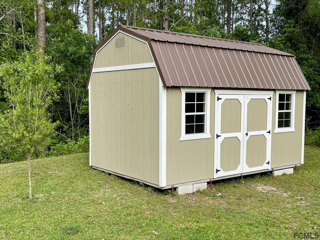 56 Karat Path Palm Coast, FL 32164 - Photo 44 of 44 QUALITY WELL-BUILT SHED!