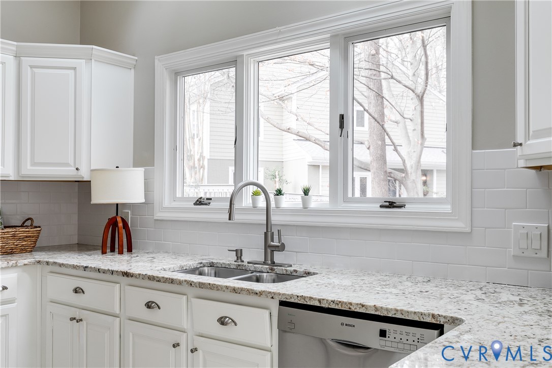3207 Stony Point Road, Unit C Richmond, VA 23235 - Photo 23 of 40 a kitchen with granite countertop a sink and a window