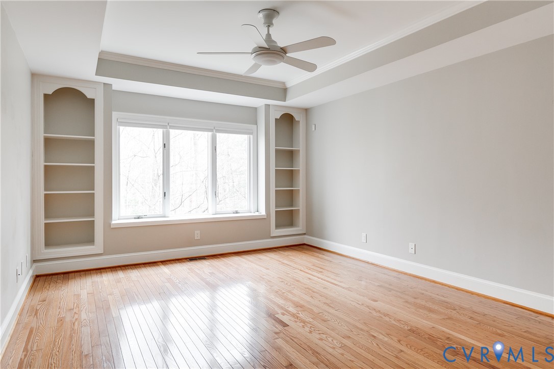 3207 Stony Point Road, Unit C Richmond, VA 23235 - Photo 25 of 40 a view of an empty room with a window and wooden floor