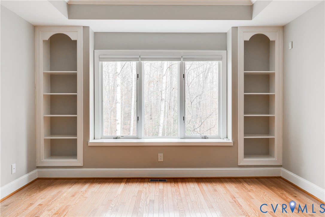 3207 Stony Point Road, Unit C Richmond, VA 23235 - Photo 26 of 40 an empty room with wooden floor and windows