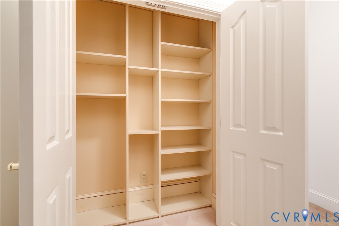 3207 Stony Point Road, Unit C Richmond, VA 23235 - Photo 35 of 40 a view of walk in closet with empty racks