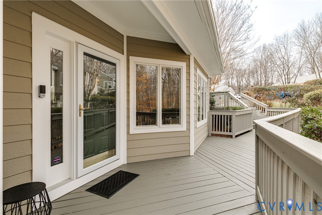 3207 Stony Point Road, Unit C Richmond, VA 23235 - Photo 5 of 40 a view of a balcony with wooden floor and fence