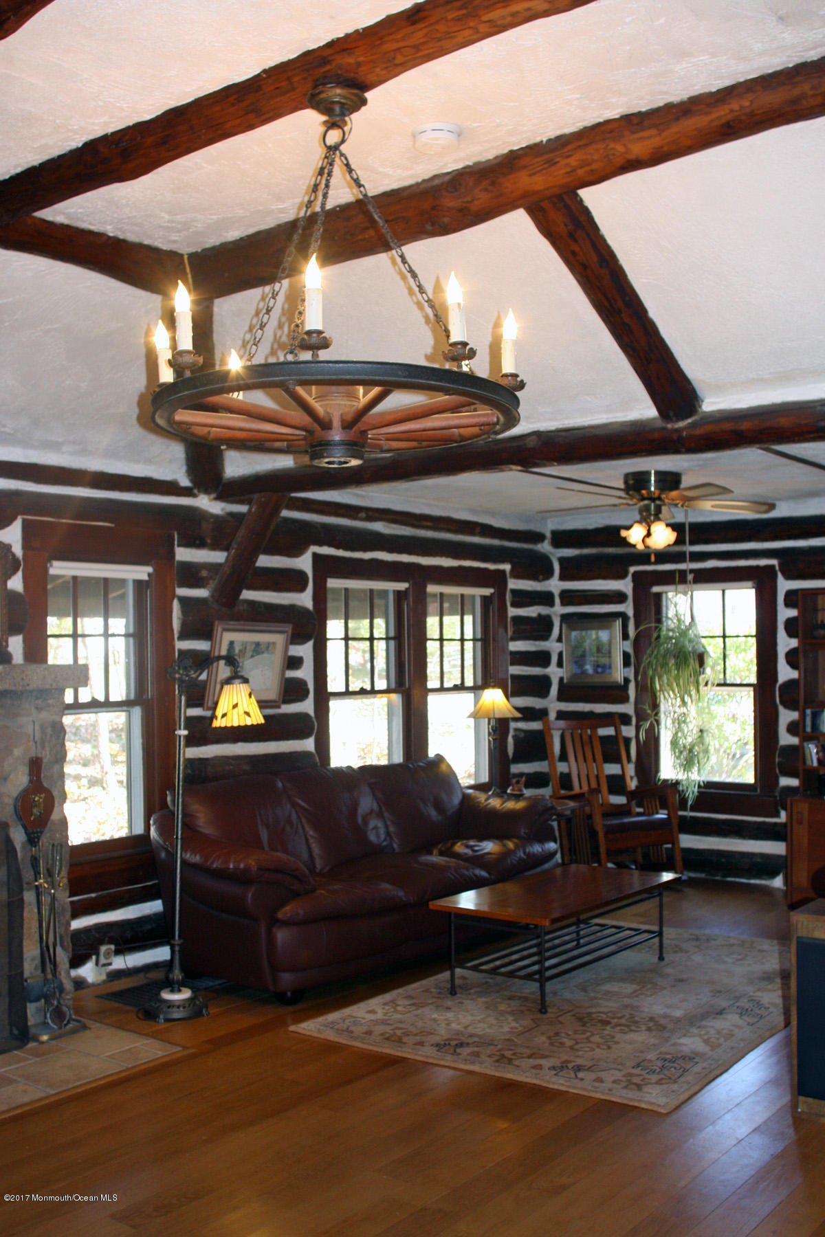 626 South Riverside Drive Neptune Township, NJ 07753 - Photo 11 of 32 a living room with furniture and windows