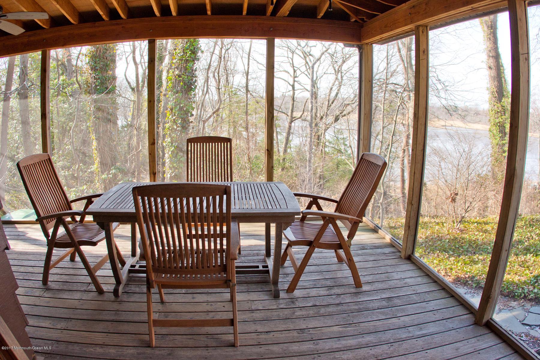 626 South Riverside Drive Neptune Township, NJ 07753 - Photo 18 of 32 a view of a two chairs in the balcony