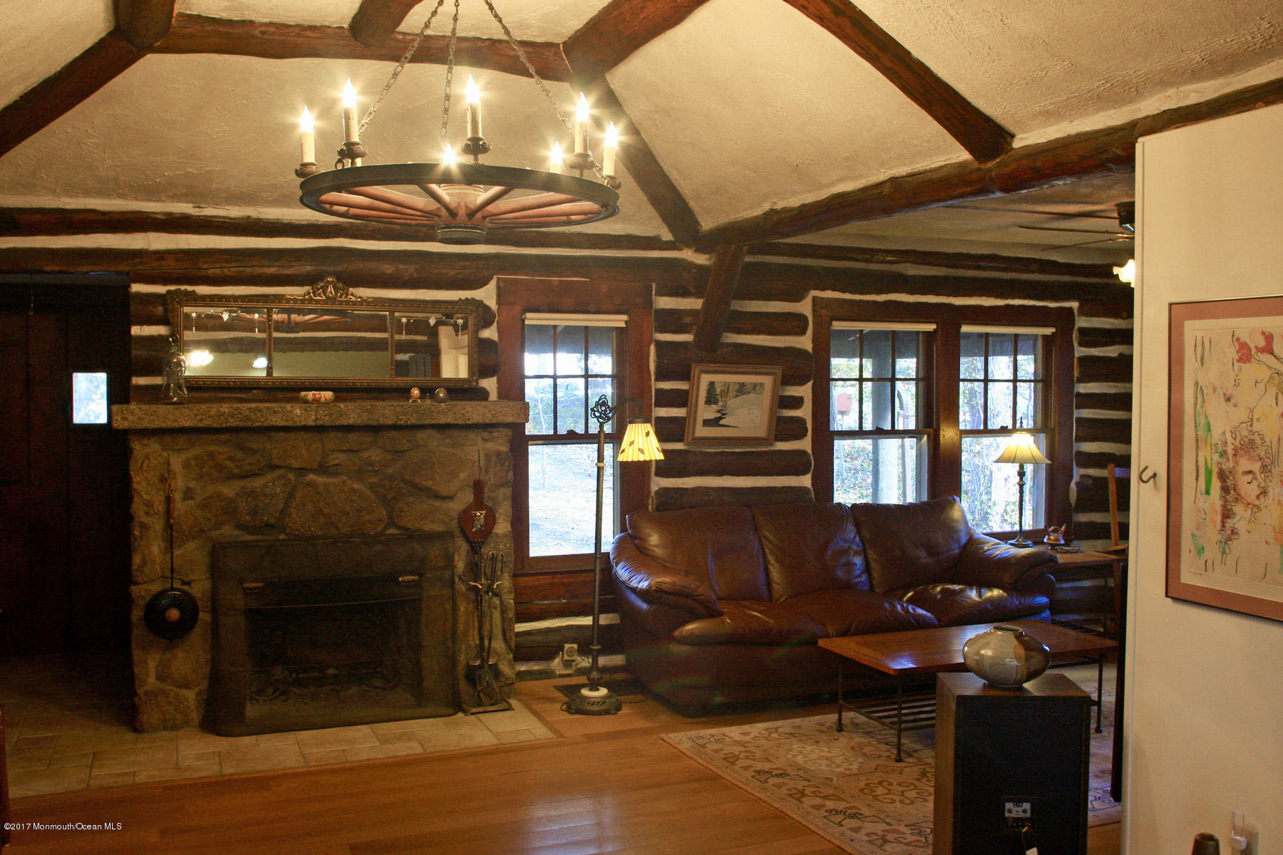 626 South Riverside Drive Neptune Township, NJ 07753 - Photo 5 of 32 a living room with fireplace furniture and a fireplace