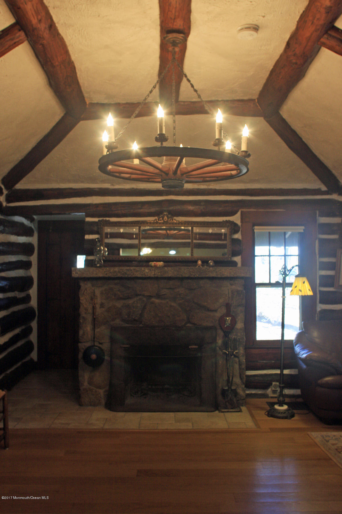 626 South Riverside Drive Neptune Township, NJ 07753 - Photo 6 of 32 a room with fireplace and windows
