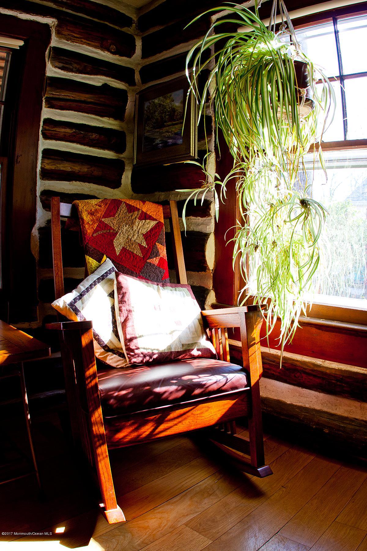626 South Riverside Drive Neptune Township, NJ 07753 - Photo 10 of 32 a backyard of a house with barbeque oven table and chairs