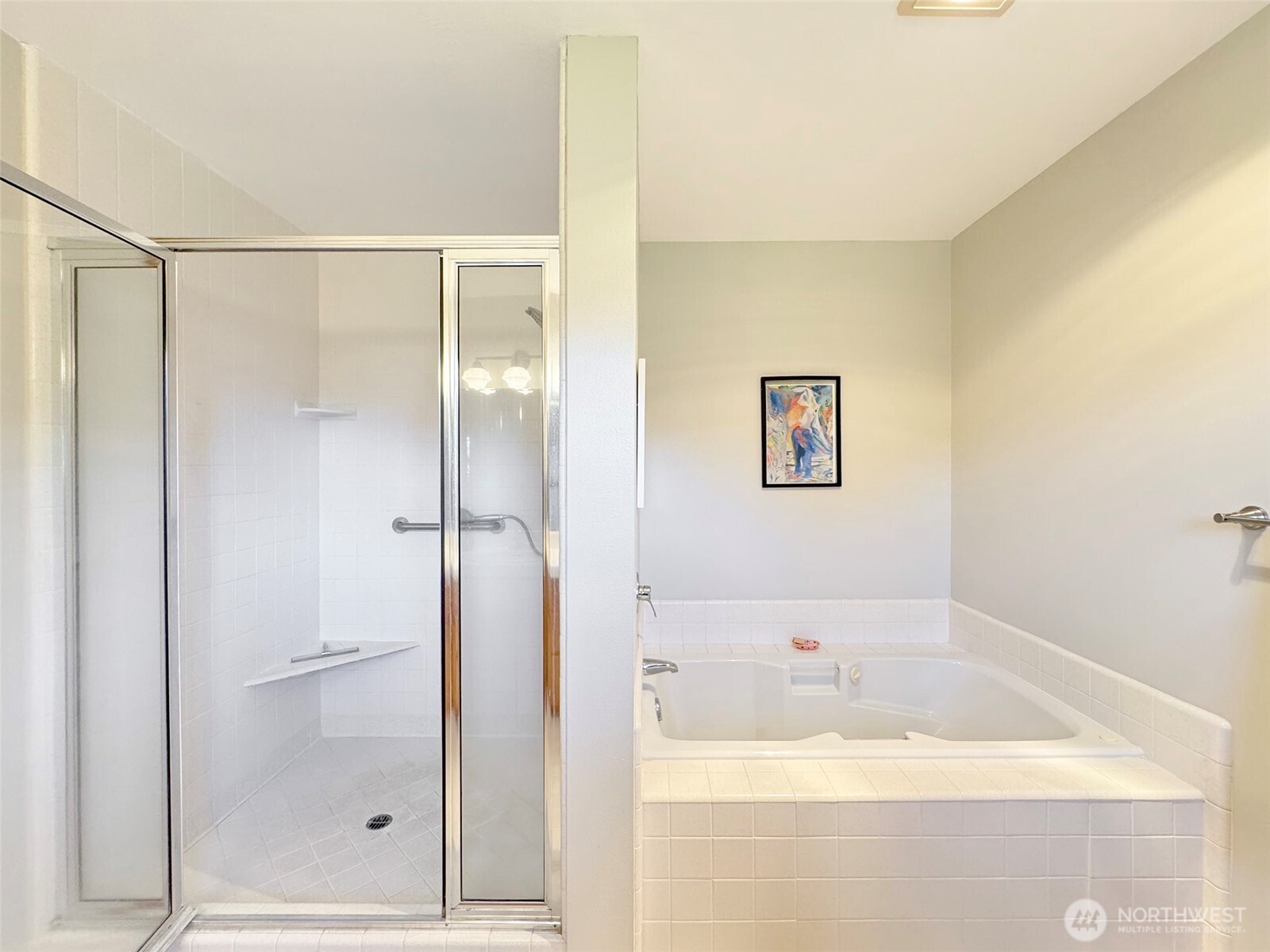 22 East Bedinger Road Sequim, WA 98382 - Photo 23 of 40 a bathroom with a bathtub and a shower