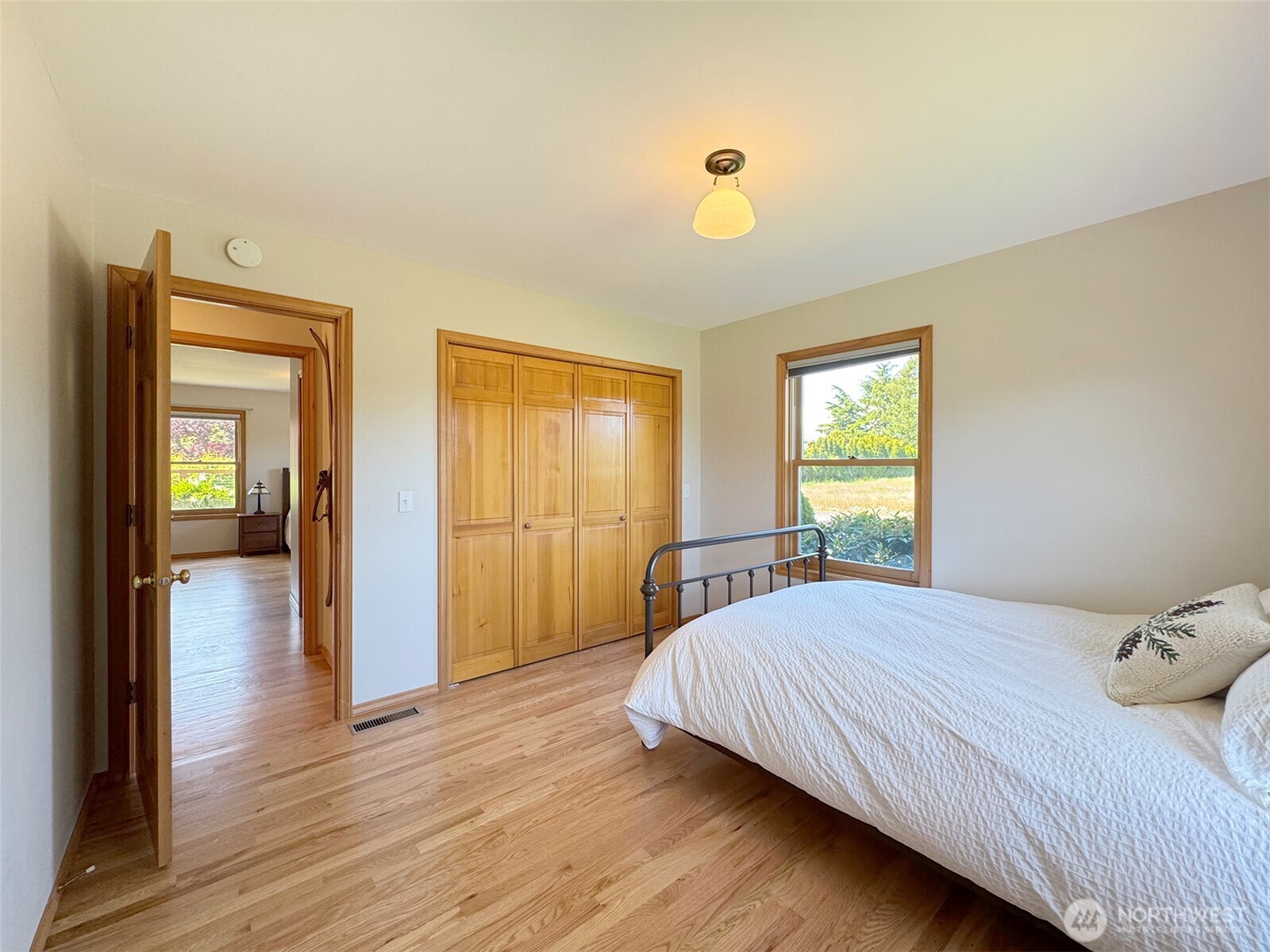 22 East Bedinger Road Sequim, WA 98382 - Photo 26 of 40 a bedroom with a bed and a window
