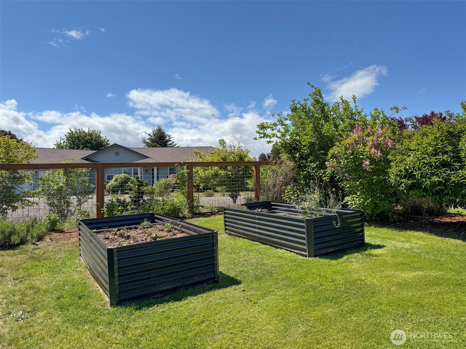 22 East Bedinger Road Sequim, WA 98382 - Photo 36 of 40 a garden view with a seating space