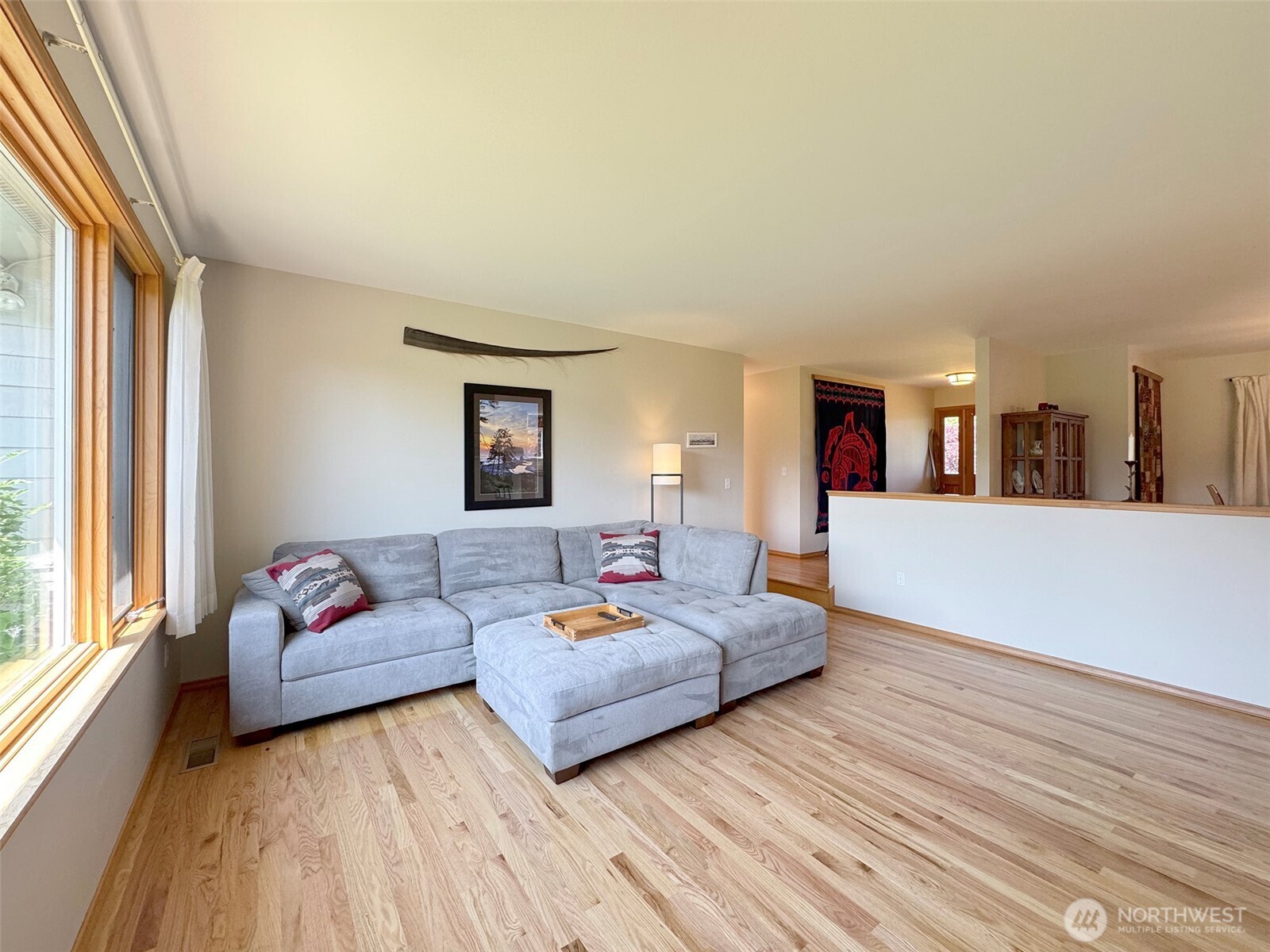 22 East Bedinger Road Sequim, WA 98382 - Photo 8 of 40 a living room with furniture and a wooden floor