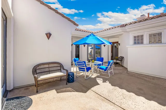 a bedroom with furniture and natural light