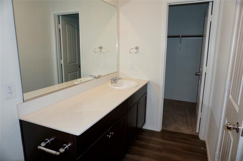 652 Autumnwood Way Princeton, TX 75407 - Photo 10 of 40 a hallway with sink