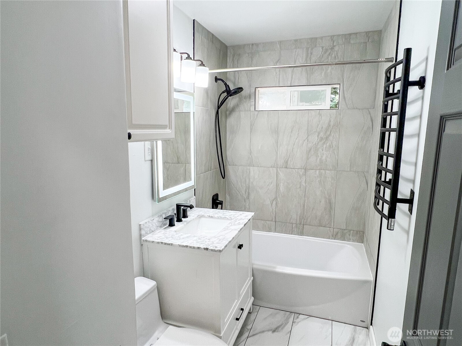 6192 State Rte 20 Port Townsend, WA 98368 - Photo 11 of 25 a bathroom with a sink a toilet and shower