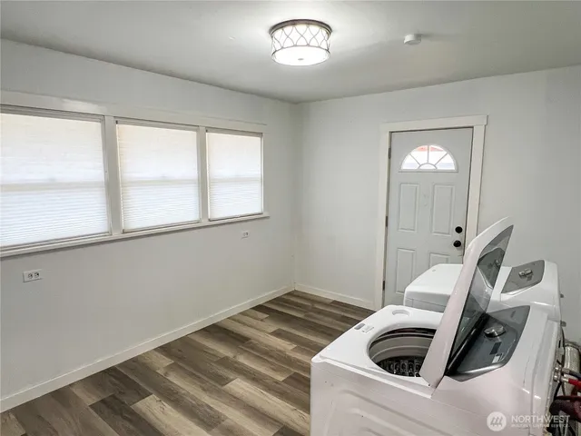 a utility room with dryer and washer
