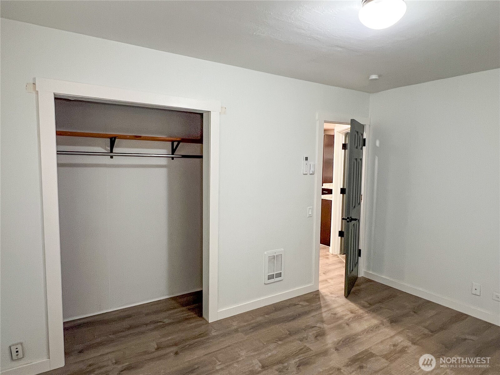 6192 State Rte 20 Port Townsend, WA 98368 - Photo 14 of 25 an empty room with wooden floor and closet