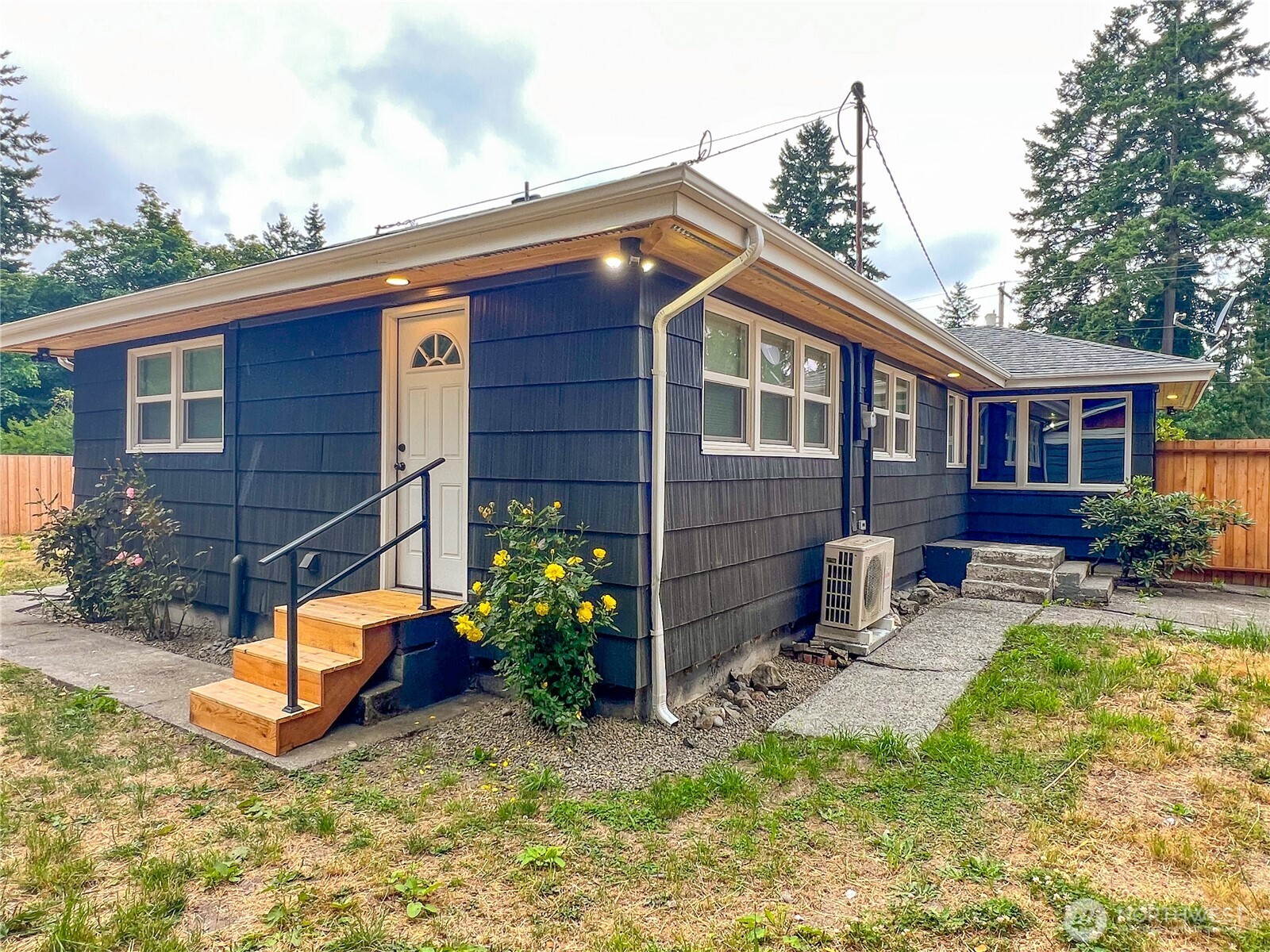 6192 State Rte 20 Port Townsend, WA 98368 - Photo 17 of 25 a backyard of a house with wooden floor yard and outdoor seating