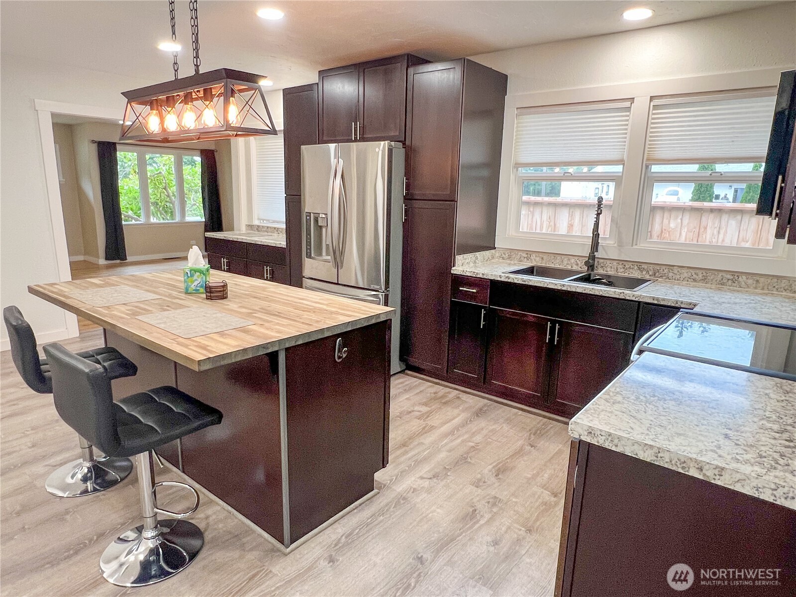 6192 State Rte 20 Port Townsend, WA 98368 - Photo 10 of 25 a kitchen with stainless steel appliances granite countertop a sink stove and refrigerator