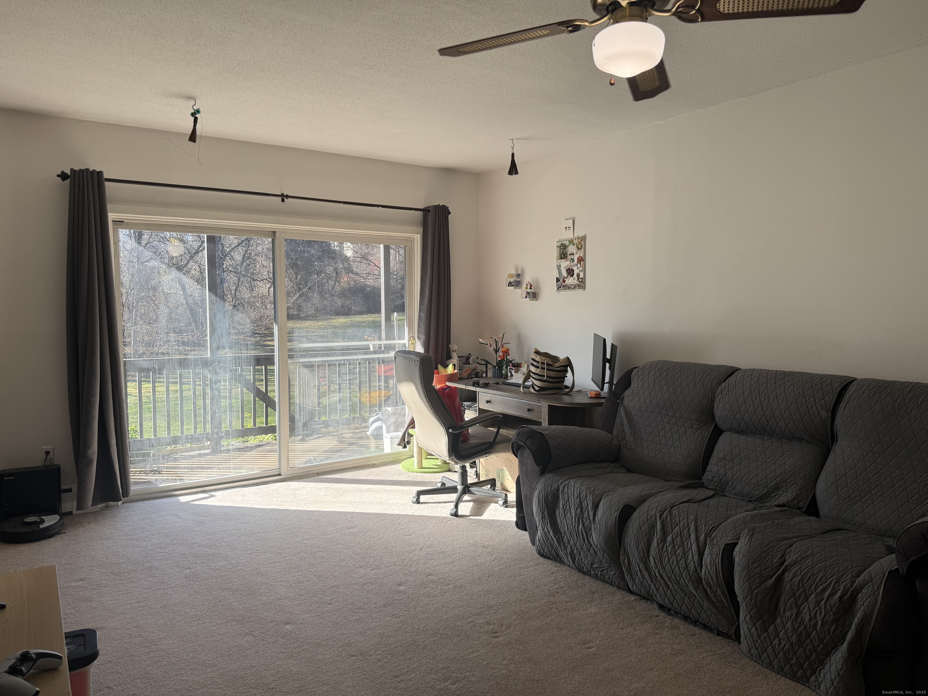 21 Balance Rock Road, Unit 2 Seymour, CT 06483 - Photo 6 of 10 a living room with furniture and a floor to ceiling window