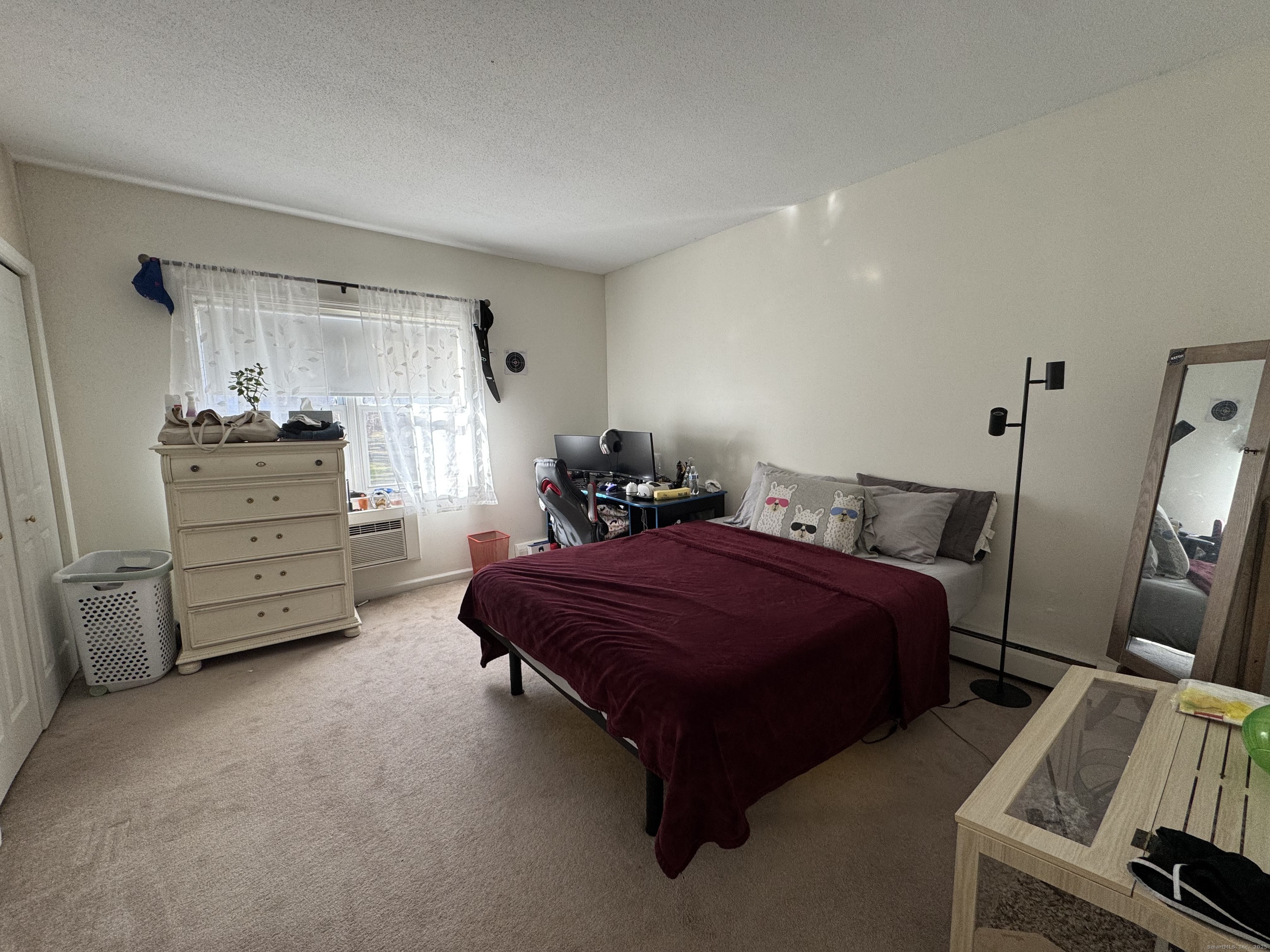 21 Balance Rock Road, Unit 2 Seymour, CT 06483 - Photo 7 of 10 a bedroom with a bed and a furniture