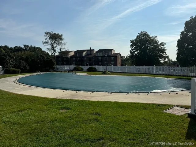 a view of a golf course with a lake