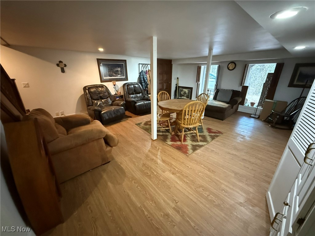 8116 Deer Road Southwest Bowerston, OH 44695 - Photo 37 of 49 Living room with light wood-type flooring and recessed lighting