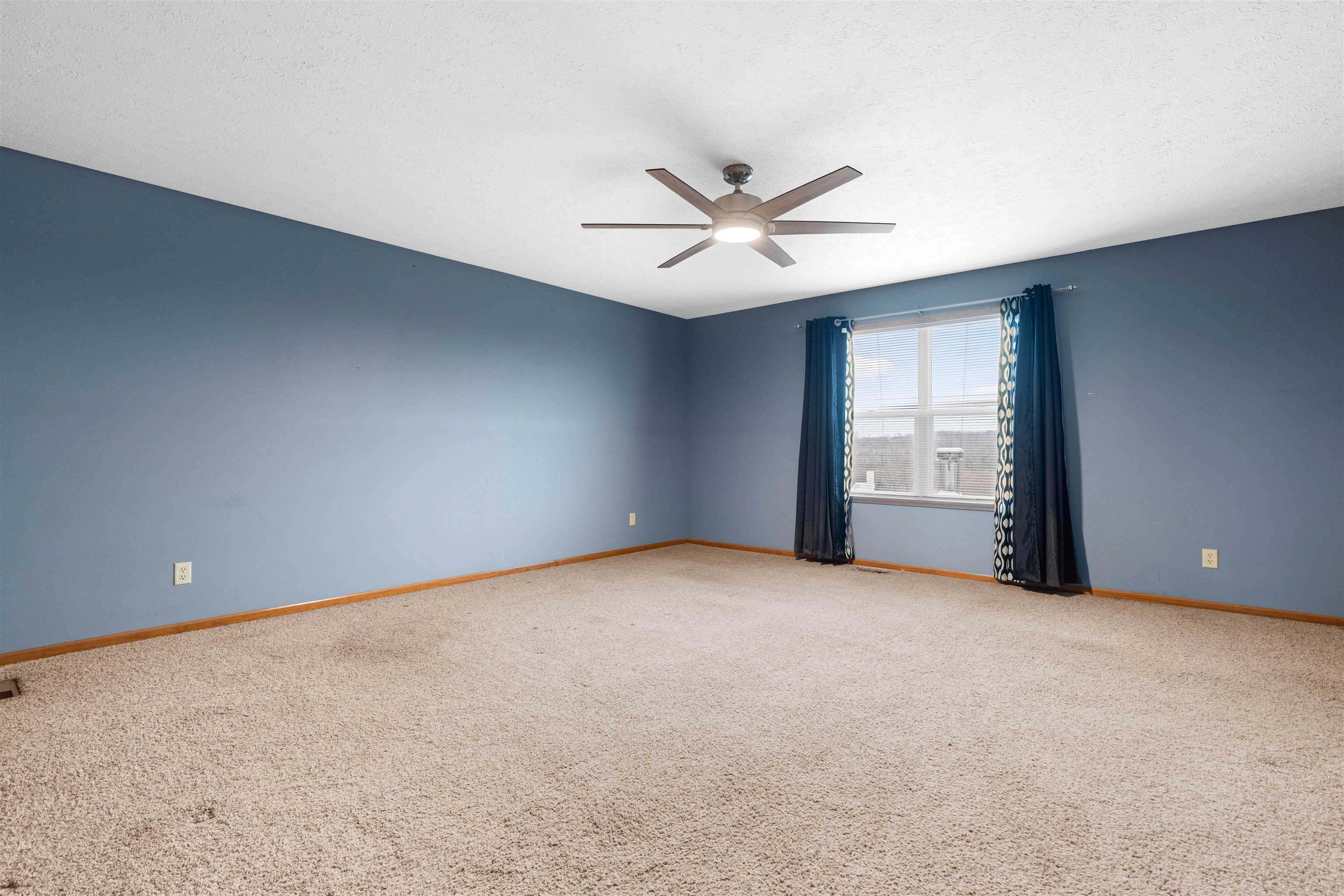 8507 Crooked Bend Road Machesney Park, IL 61115 - Photo 14 of 33 a view of an empty room with a window