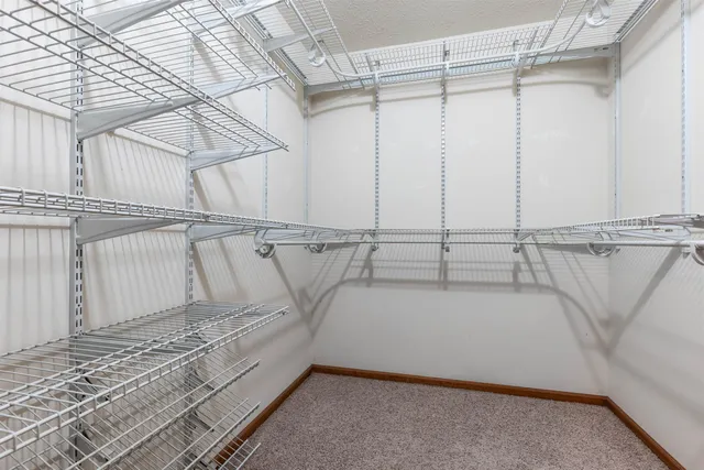 a view of a room with racks on the wall