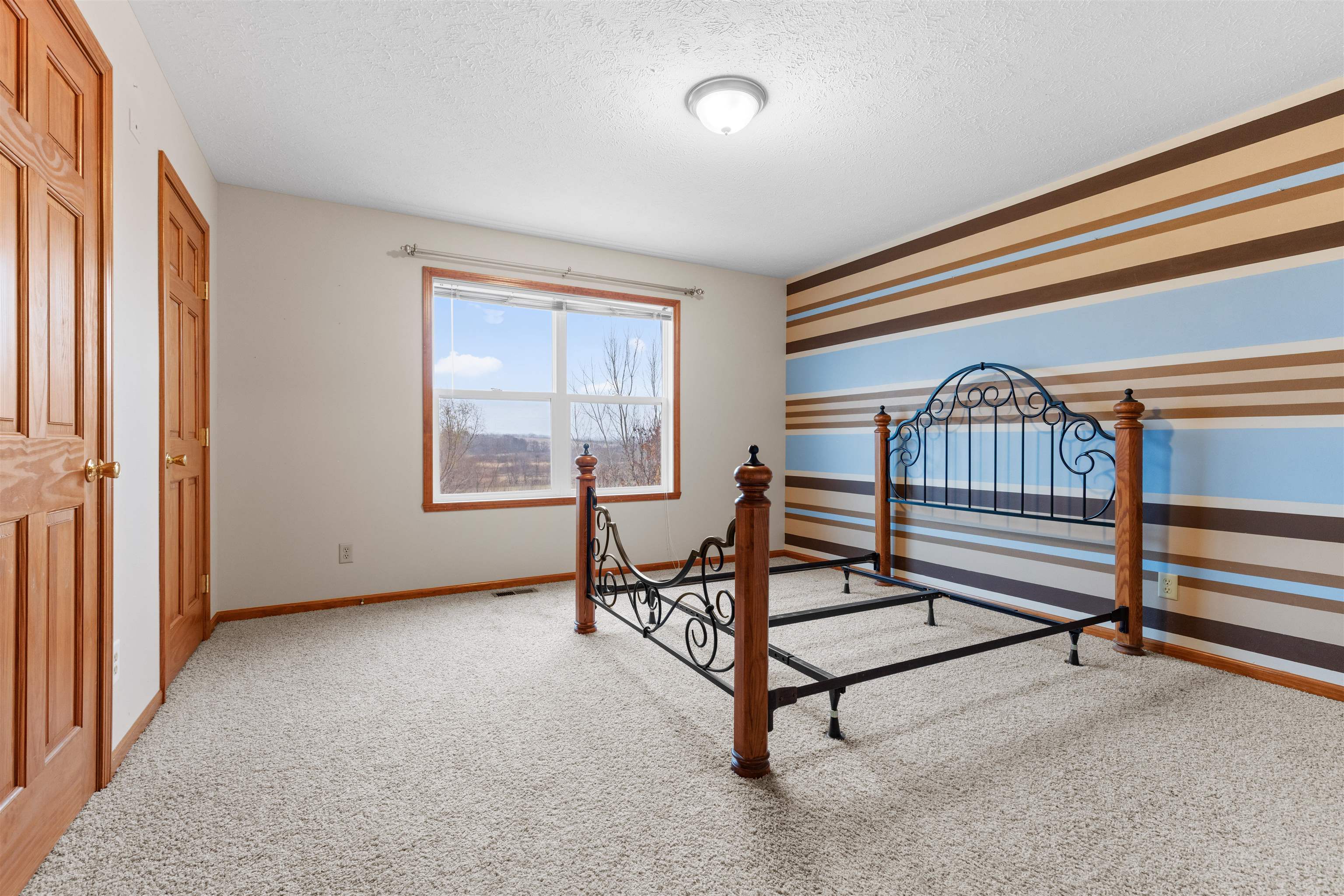8507 Crooked Bend Road Machesney Park, IL 61115 - Photo 19 of 33 a view of a livingroom with furniture and a window
