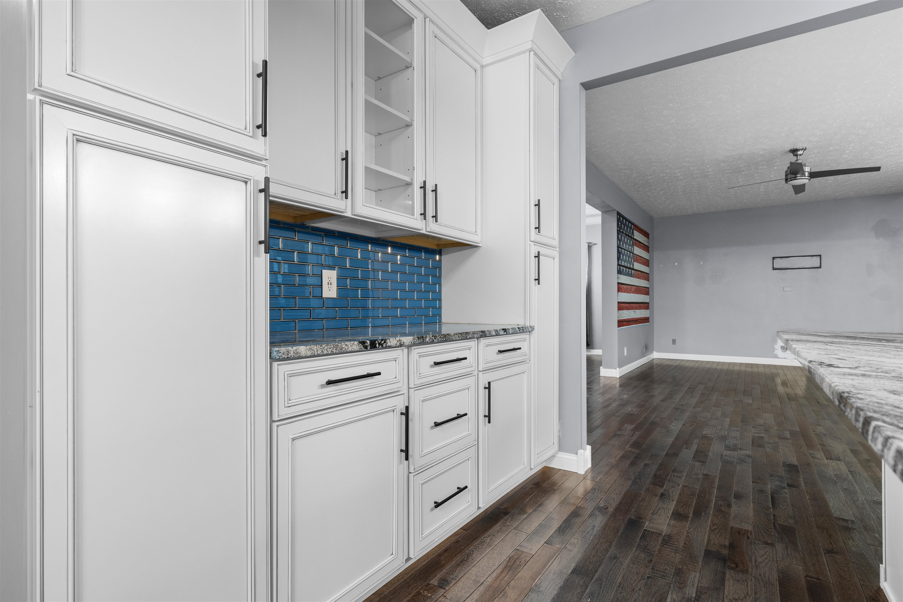 8507 Crooked Bend Road Machesney Park, IL 61115 - Photo 26 of 33 a kitchen with white cabinets and white appliances