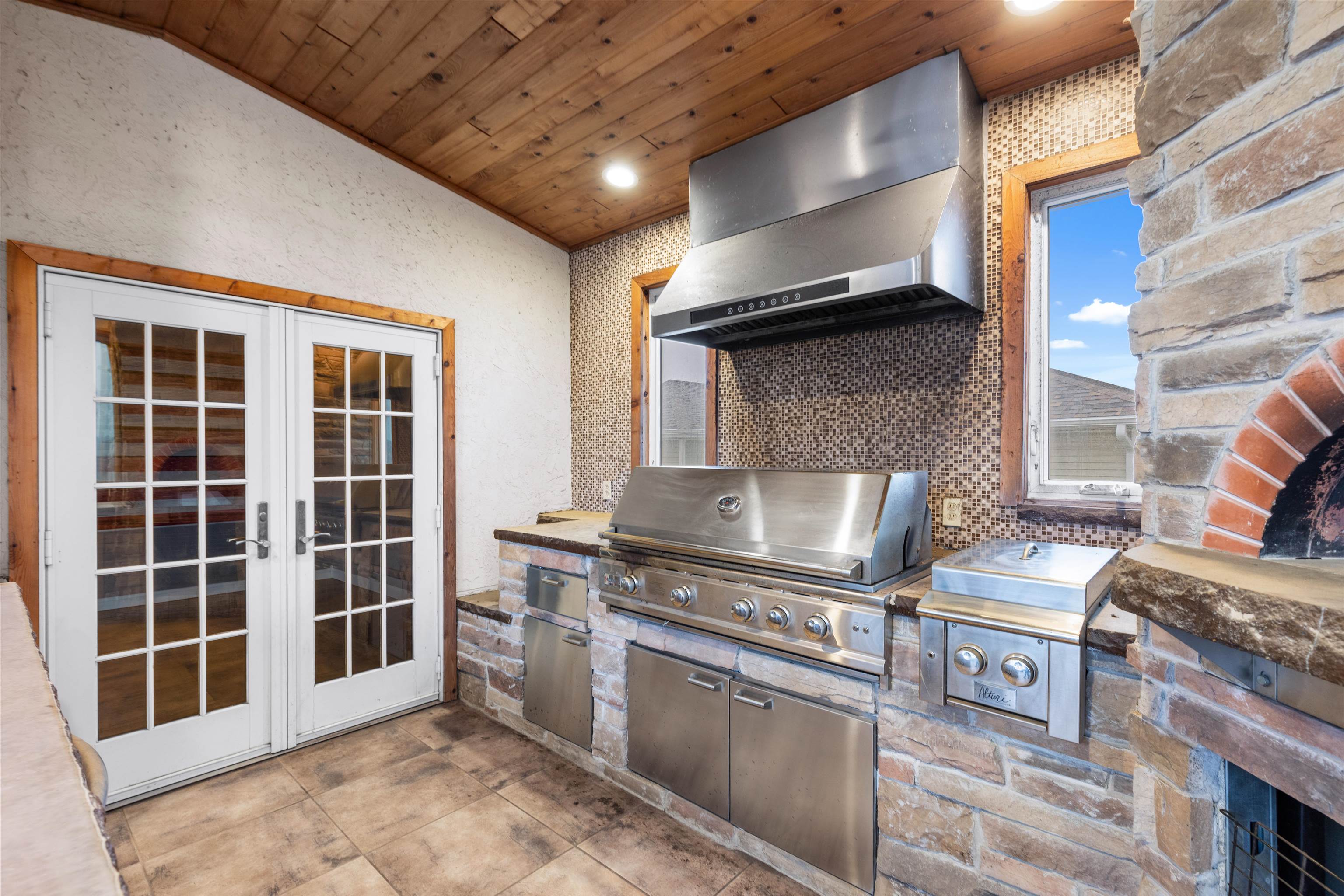 8507 Crooked Bend Road Machesney Park, IL 61115 - Photo 4 of 33 a kitchen with stainless steel appliances granite countertop a stove and a sink