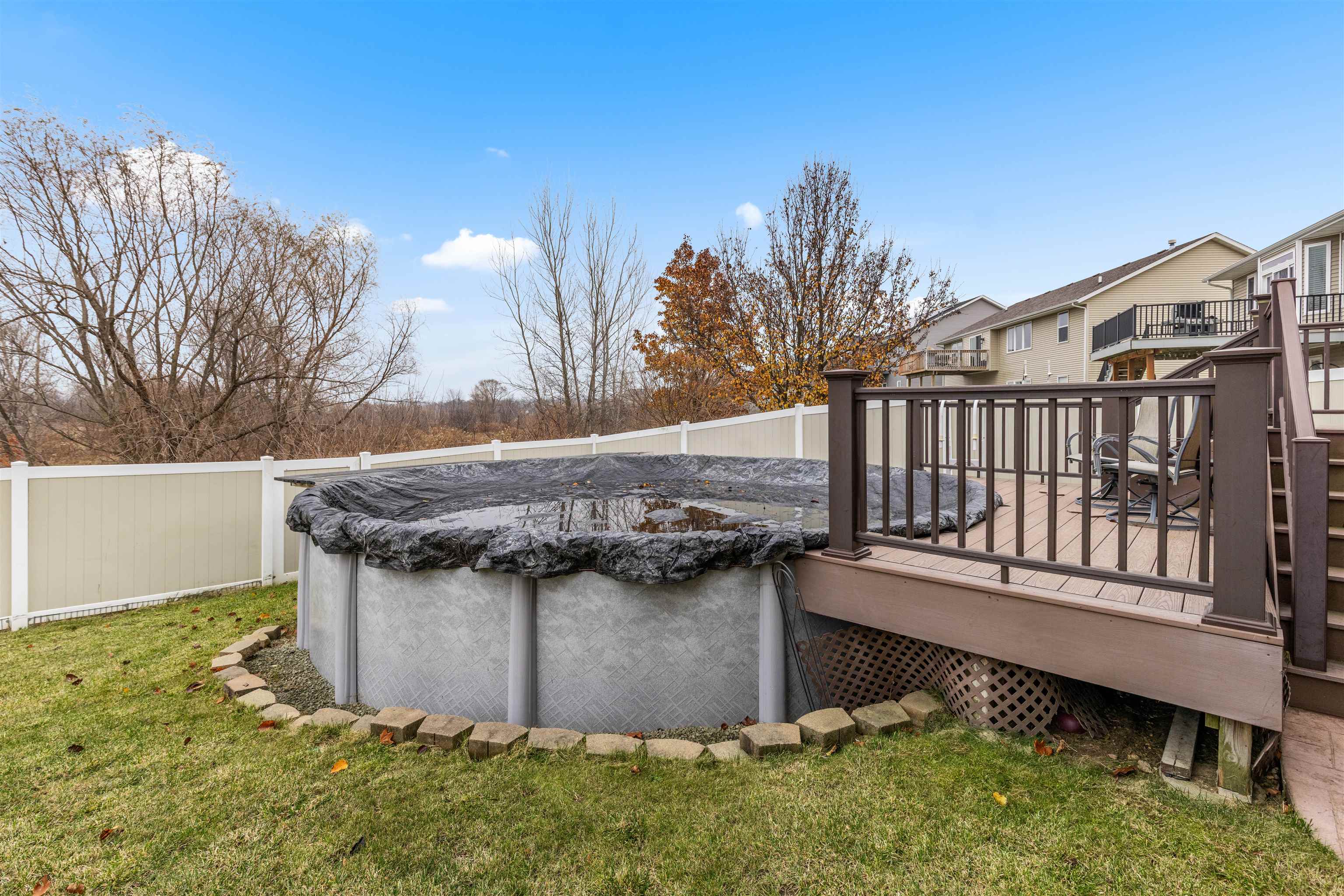 8507 Crooked Bend Road Machesney Park, IL 61115 - Photo 7 of 33 a view of a backyard with a tub