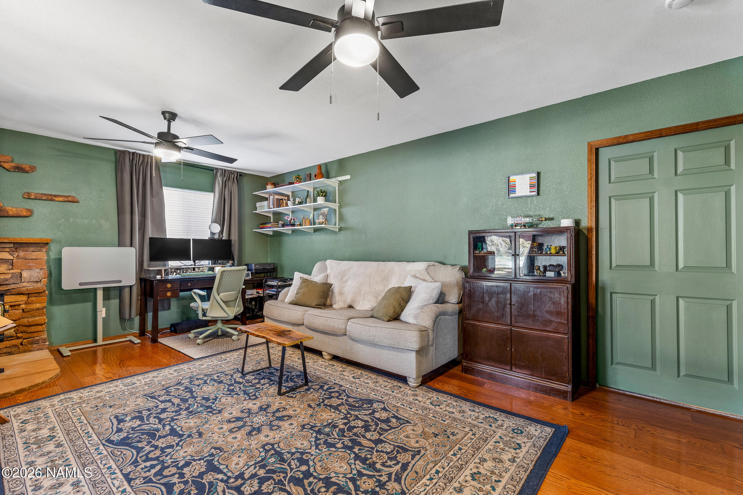 8980 Crystal View Lane Flagstaff, AZ 86004 - Photo 10 of 33 a living room with furniture and wooden floor