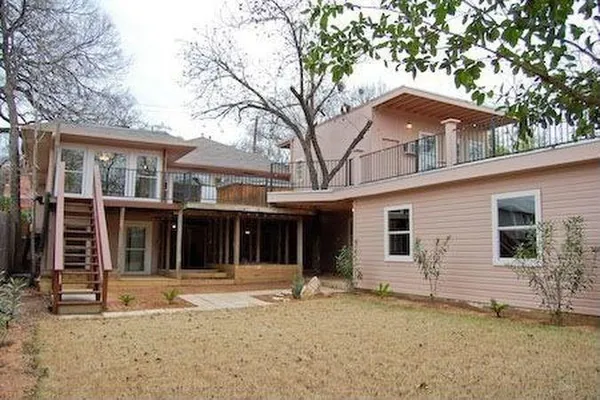a house with trees in front of it