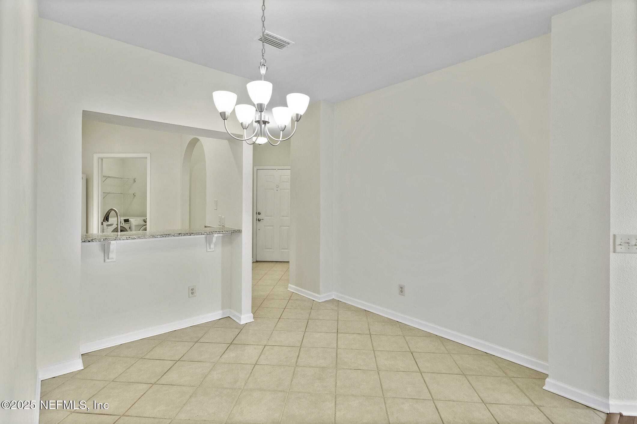 2521 Vista Cove Road St. Augustine, FL 32084 - Photo 12 of 64 a view of a chandelier fan and entryway
